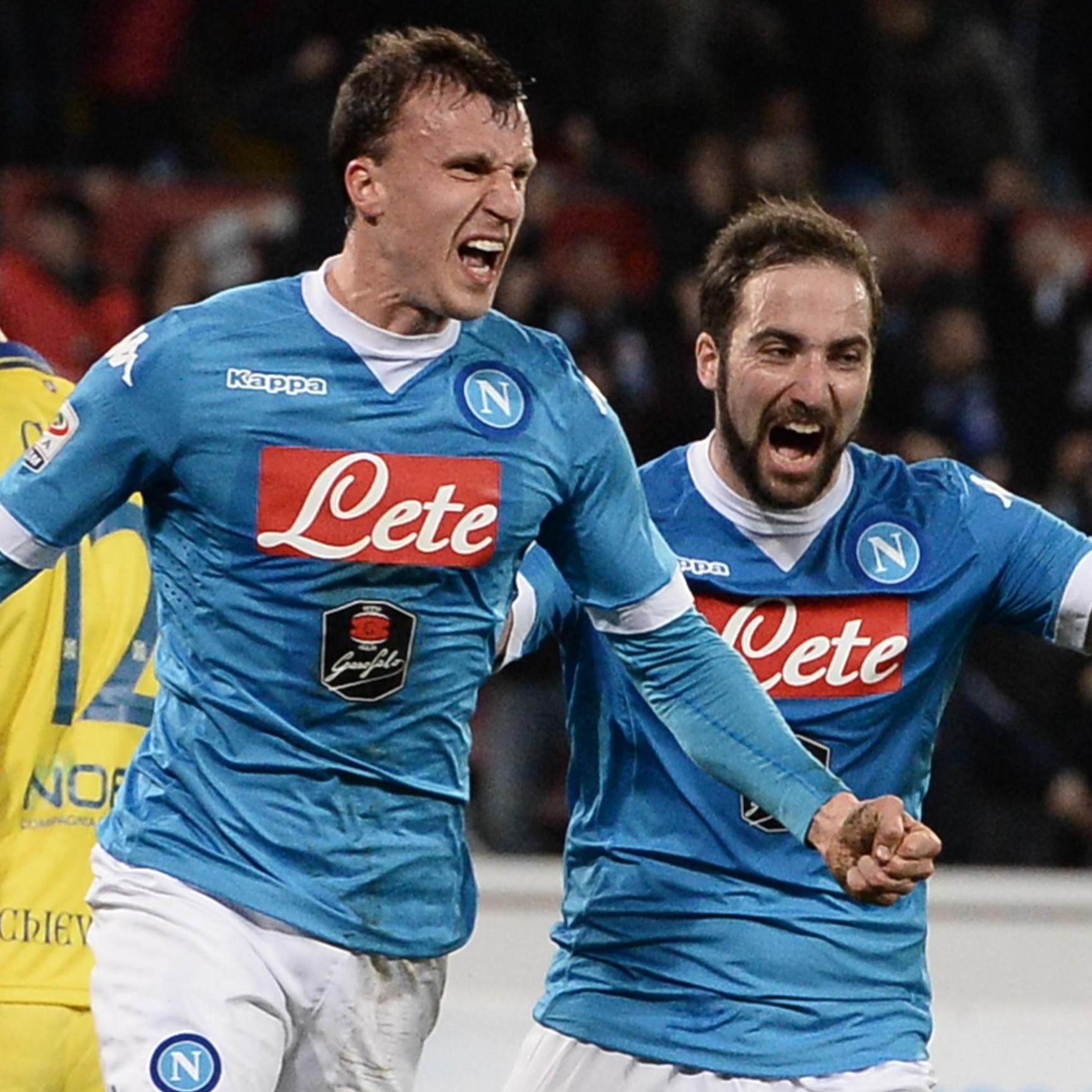 Napoli's defender Vlad Chiriches celebrates with his teammates after scoring the goal of the 2-1 during the Italian Serie A soccer match between SSC Napoli and Chievo Verona at  San Paolo Stadium in Naples, 5 March 2016. 
ANSA/ CIRO FUSCO